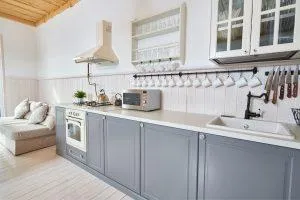 Kitchen with white gray cabinetry