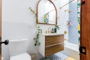 guest bathroom with decorated walls