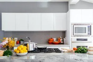 traditional kitchen with stone counters and floors