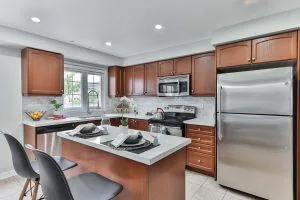 kitchen with blonde wood veneer cabinets